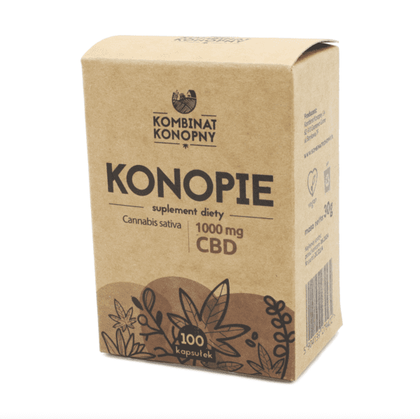 Brązowe, ekologiczne opakowanie suplementu diety marki Kombinat Konopny. Na froncie widnieje duży napis „KONOPIE”, a poniżej informacja o zawartości 1000 mg CBD i 100 kapsułkach. Grafika roślinna na dole nawiązuje do naturalnego pochodzenia składników.